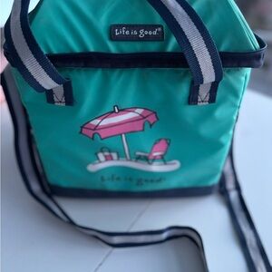 Life Is Good Aqua Cooler Bag with Pink Beach Design holds 24 cans